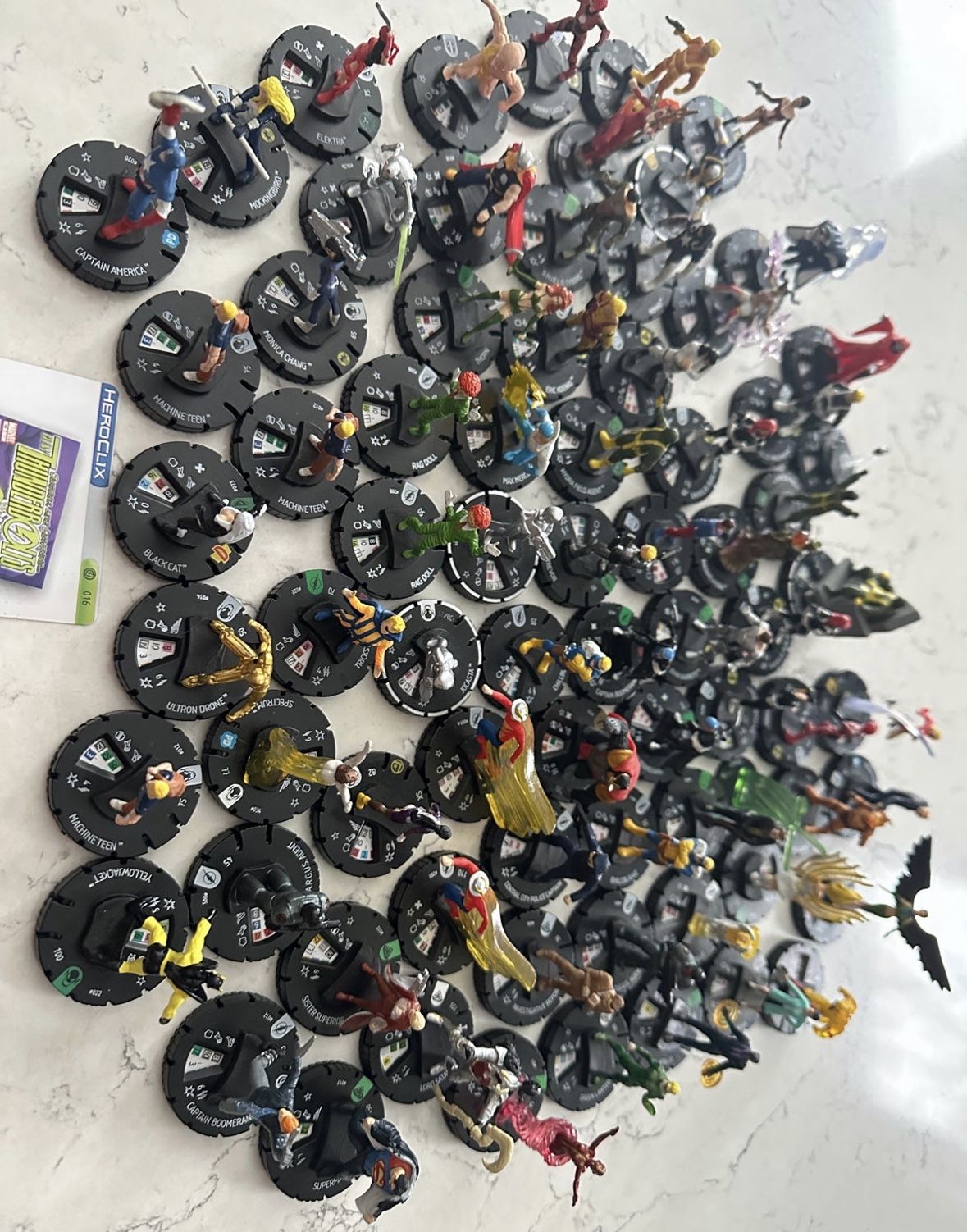 Lot of 75 Marvel / The Flash / Superman / Venom / Deadpool WizKids Including: - “the Flash” Mini Figurines 2014 Wizkids/Neca HeroClix. - Captain Am