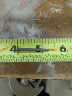 Bucket of small galvanized nails