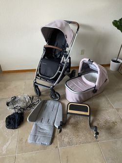 Uppababy Cruz V2 Stroller With Bassinet And Piggyback Board Pink