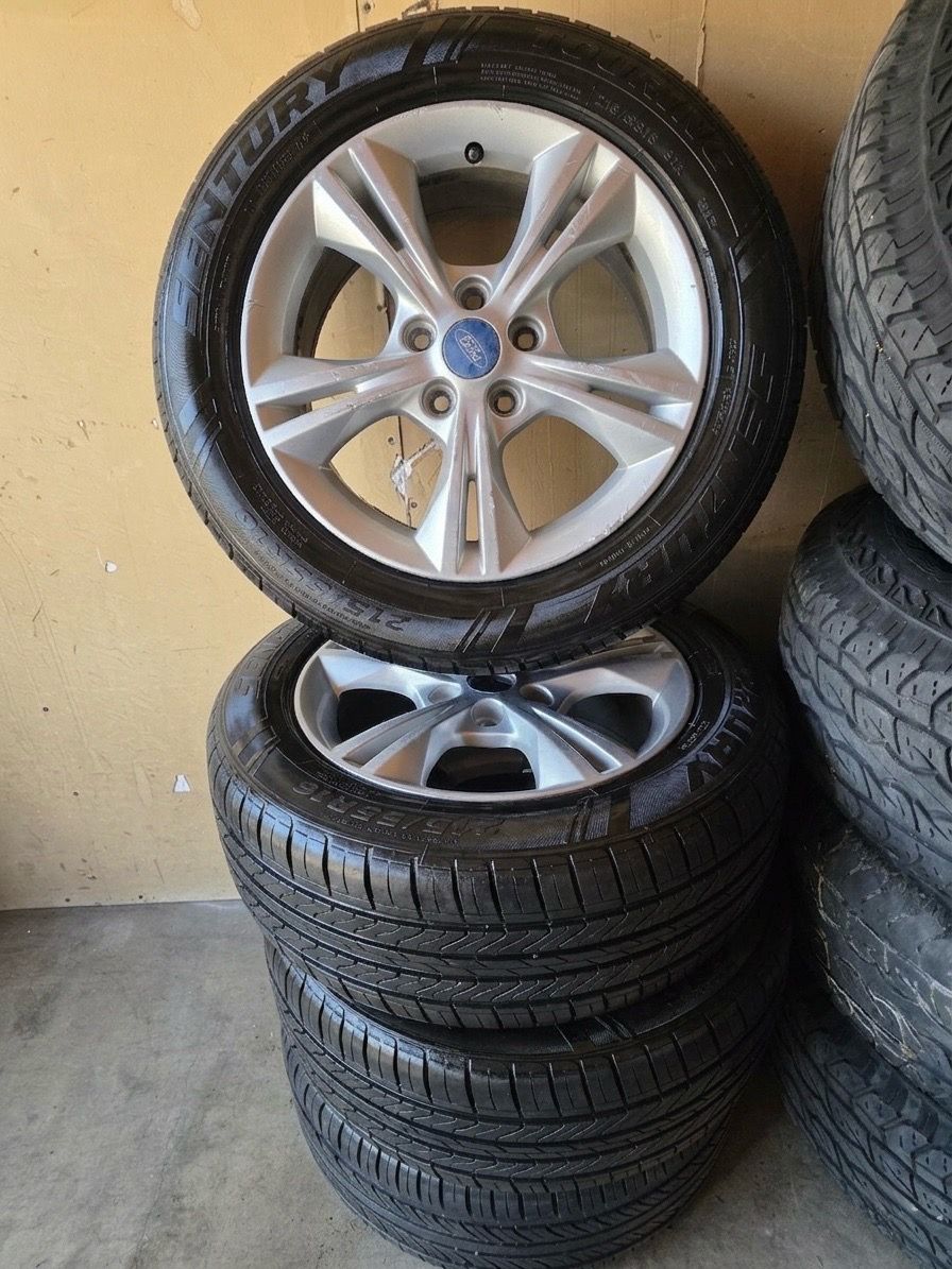 Set of 4 OEM 2014 Ford Focus 16" Alloy Rims & Tires - Cleaned & Shined