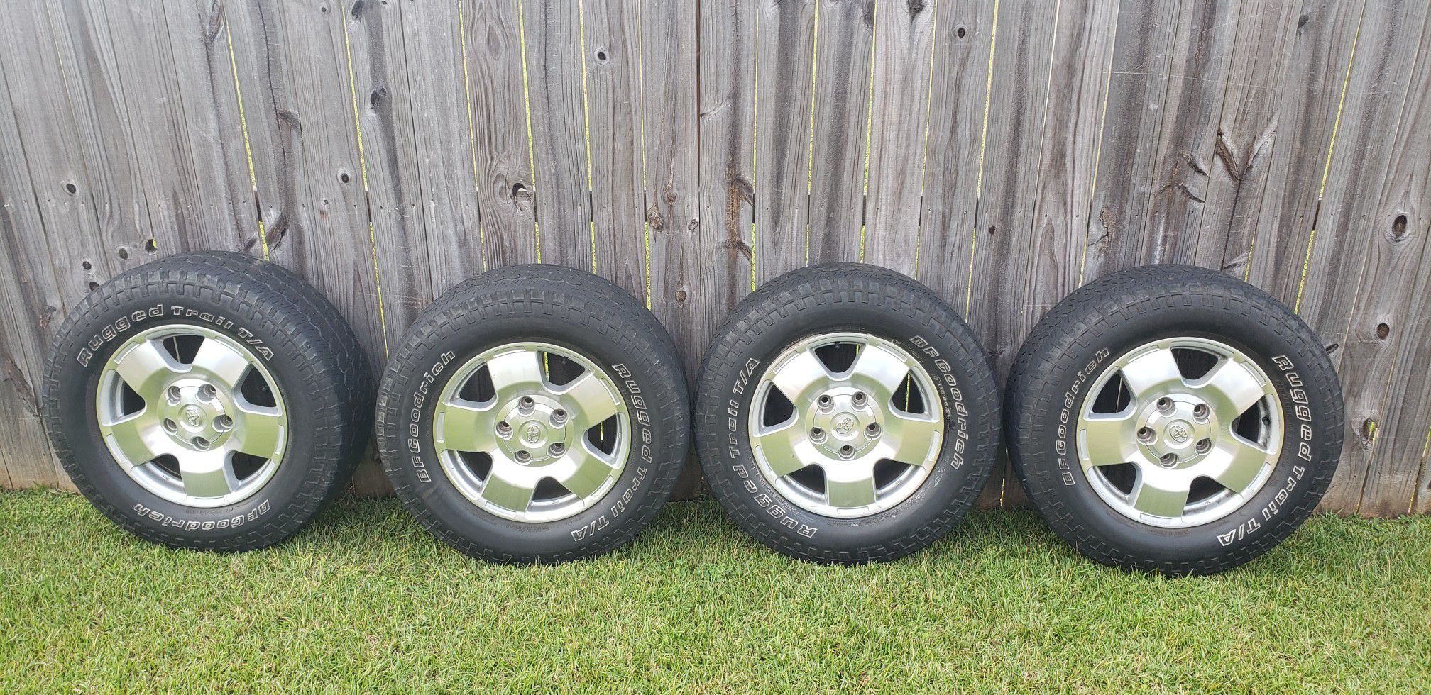 Four size 18 Toyota Tundra rim and tires