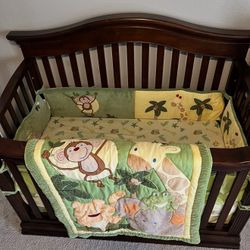 4 In 1 Convertible Crib with Padding, Bed, Comforter and Skirt - Excellent Condition. No Scratches At All