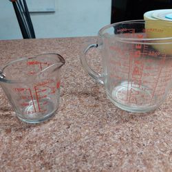 Vintage measuring cups $20