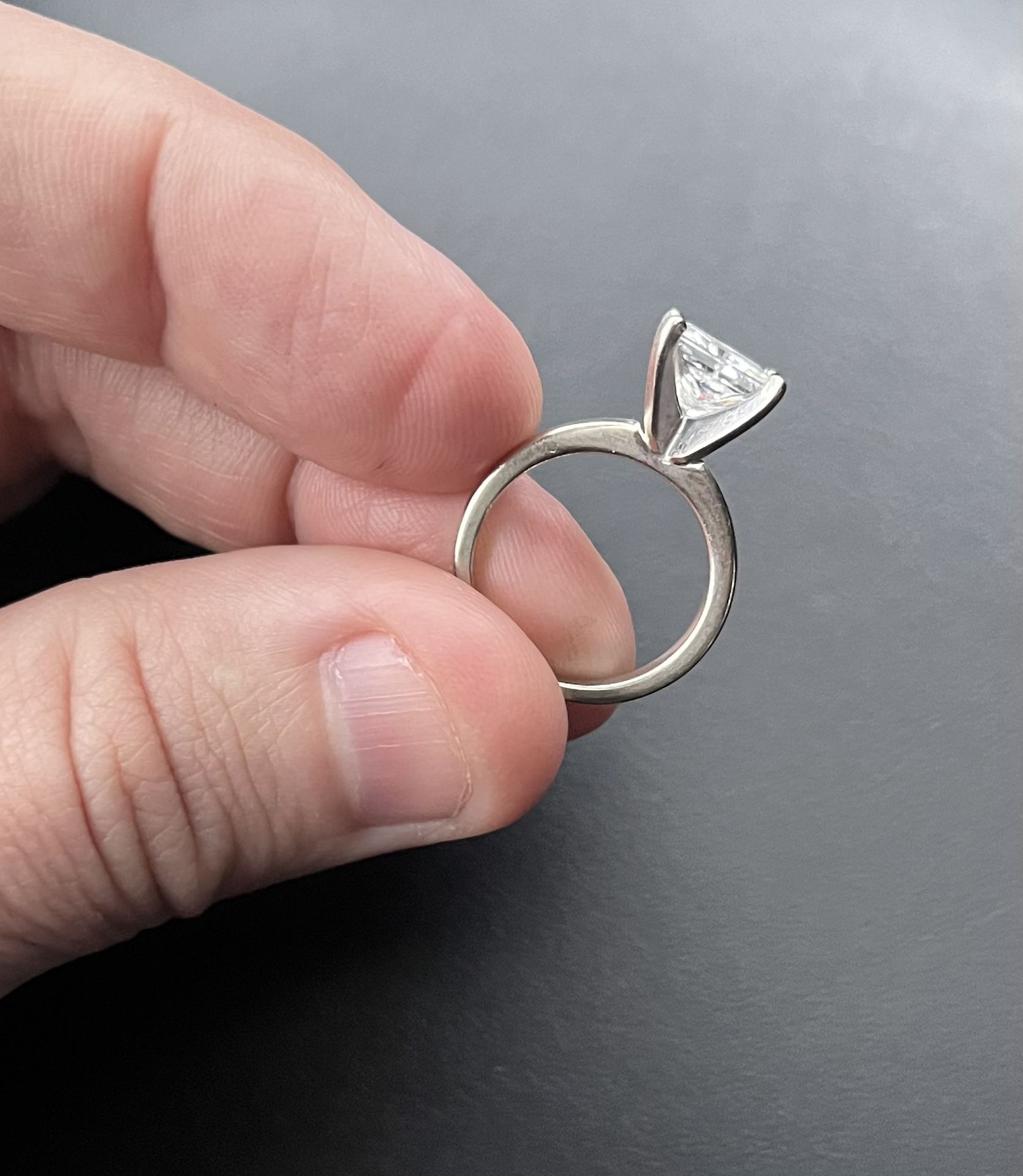 Wedding Ring. 14k White Gold and A moissanite gem