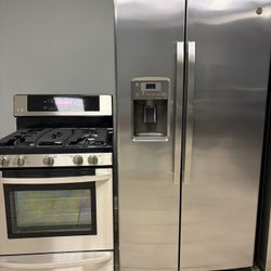 GE side x side refrigerator &. LG 5 burner gas range set stainless steel 