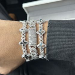 Clover And Cuban Link Bracelets