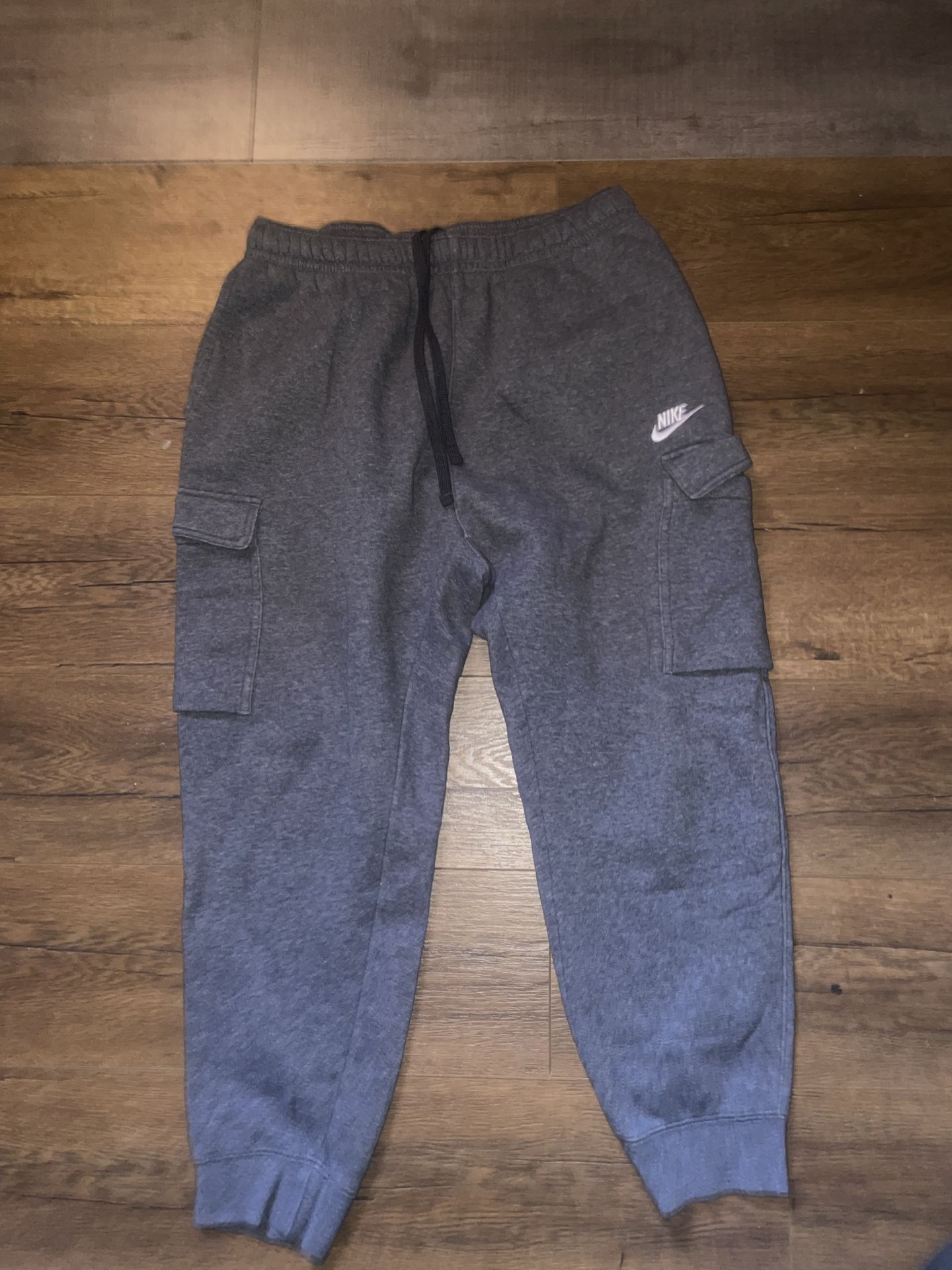 Dark grey Nike sweats