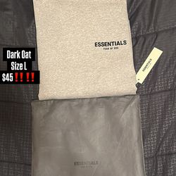 Essential hoodie dark oat