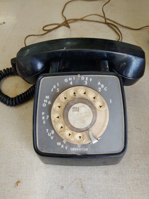 Vintage 1970's GTE Automatic Electric brown rotory dial desk phone