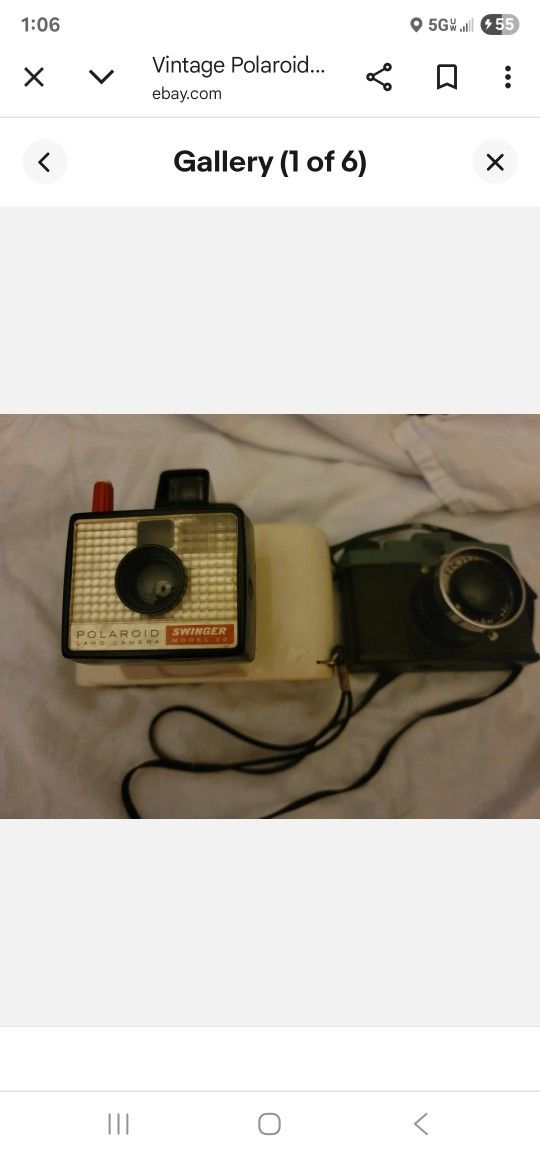 Vintage Polaroid Swinger Camera plus free camera