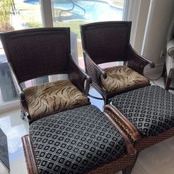 Pair Of Rattan Chairs with Ottomans 