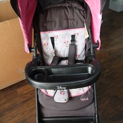 Disney Baby Simple Fold LX Travel System in the Minnie Dot Party pattern