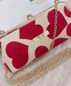 MlU MlU women heart gift new in box authentic