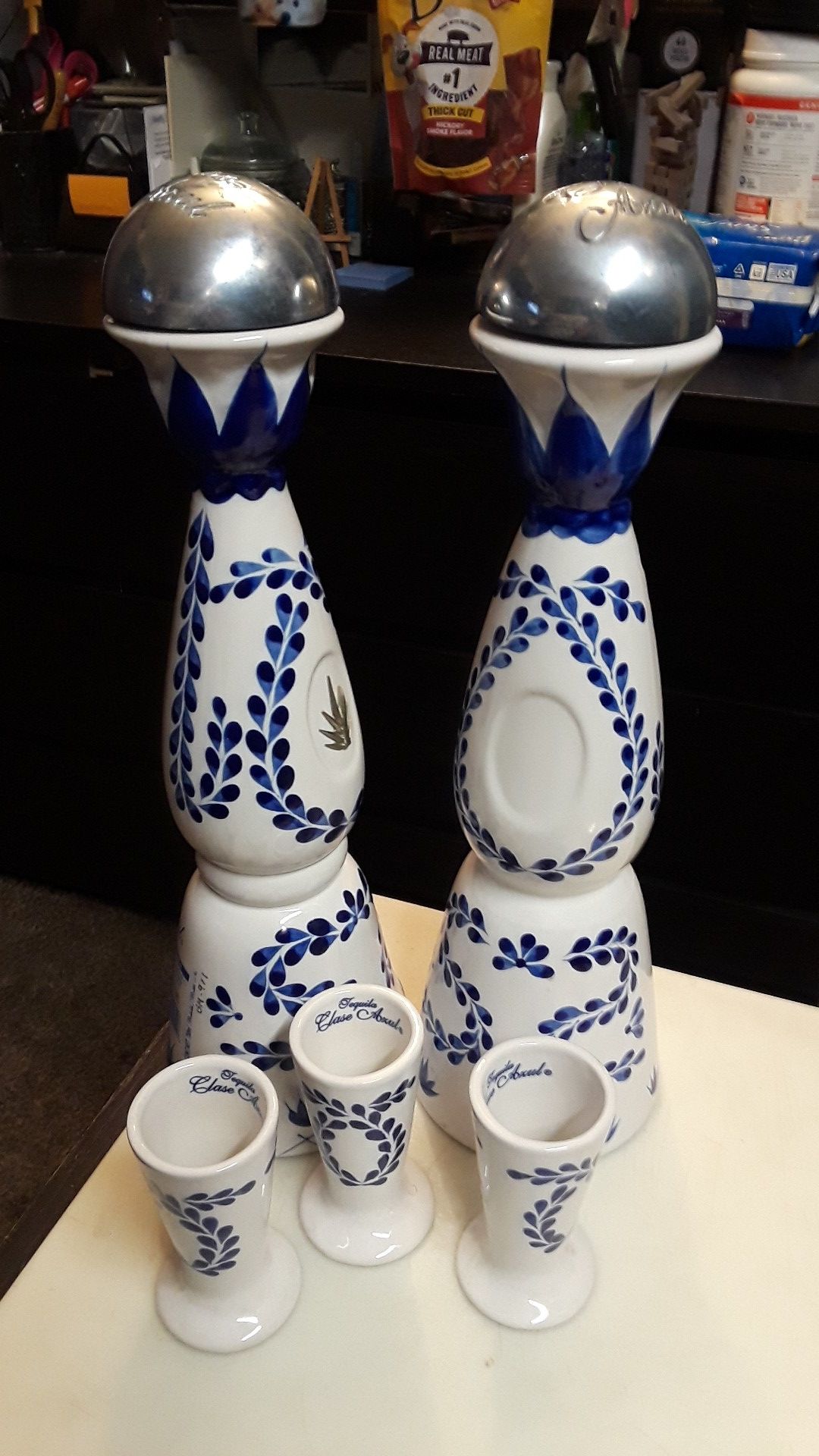 2- clase Azul tequila bottles & shot glasses