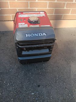 Honda generator with electric start and pull start model EU3000is inverter everything works great and runs great no trades 