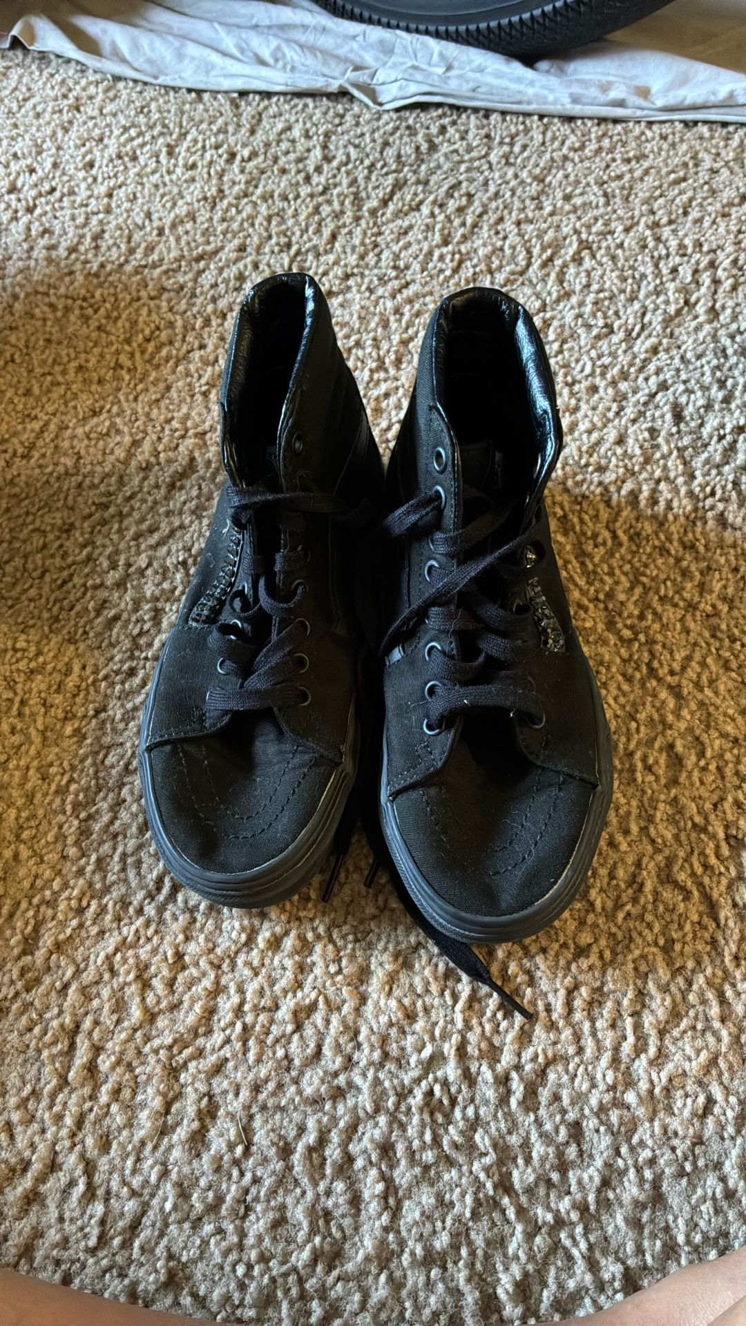 Girls Vans Hi Top Skate Shoes.