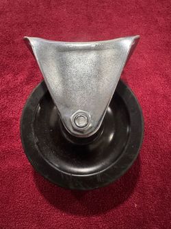 Caster, Rigid, 4" x 1 1/4", Hard Rubber Wheel, Mounting Plate    Fe16)