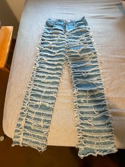 Light Wash Heavily Distressed Jeans