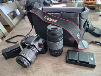 Canon EOS Rebel DSLR Camera with Two Lenses and Bag
