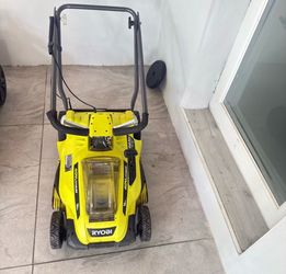 Free Ryobi Lawnmower as is. It turn on sometimes so it need fix