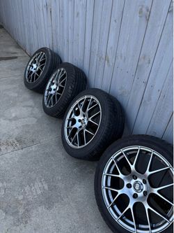 Enkei Raijin 18x8” rims and tires