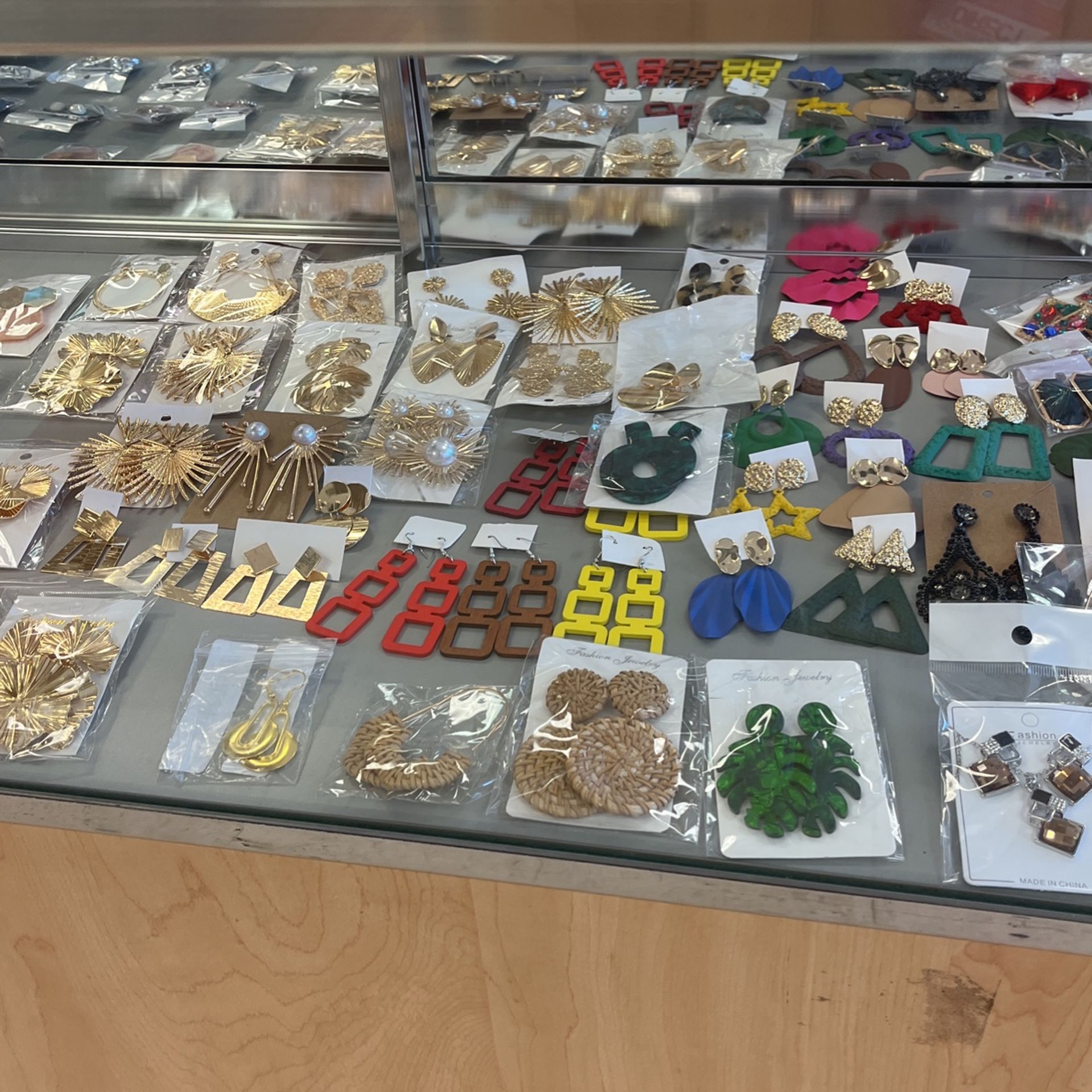 Assorted variety of earrings and rings