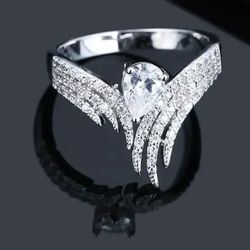 COMPLETE BLING IN THIS CZ STAINLESS STEEL FOREVER WEAR WINGS NEW SIZE 6 RING 