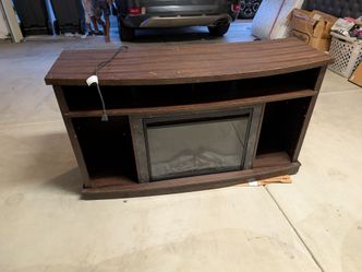 Entertainment center with fireplace