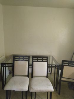 Glass table and 4 chairs