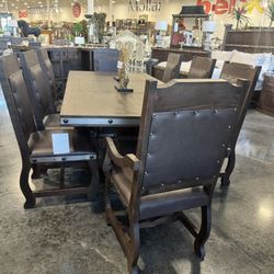  9 PIECE DINING ROOM SET Includes: Dining table. 6 side chairs, 2 arm chairs. 