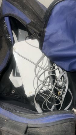 Wii console with cord and controller