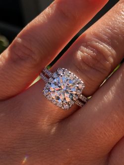 Cushion halo moissanite and diamond ring