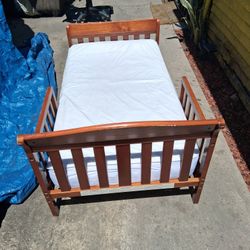 Toddler bed brown Real wood with mattress included