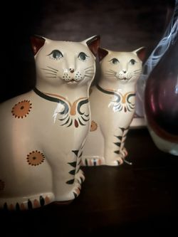 Two Prestige Place nesting ceramic cat candle holder