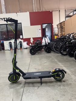 Electric scooter with shock absorption