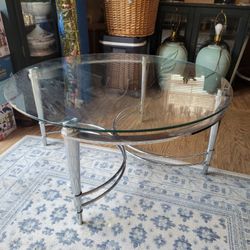 Round 40" Glass Table with  Sturdy Steel  Legs Height of Table19" High.