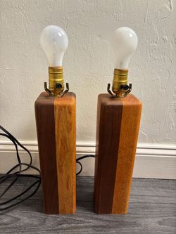 Pair of mid century modern carved wood table lamps