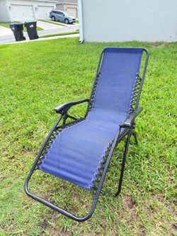 Selling a blue outdoor patio lounge chair.