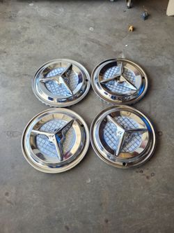 14 inch tri-bar hubcaps new $100