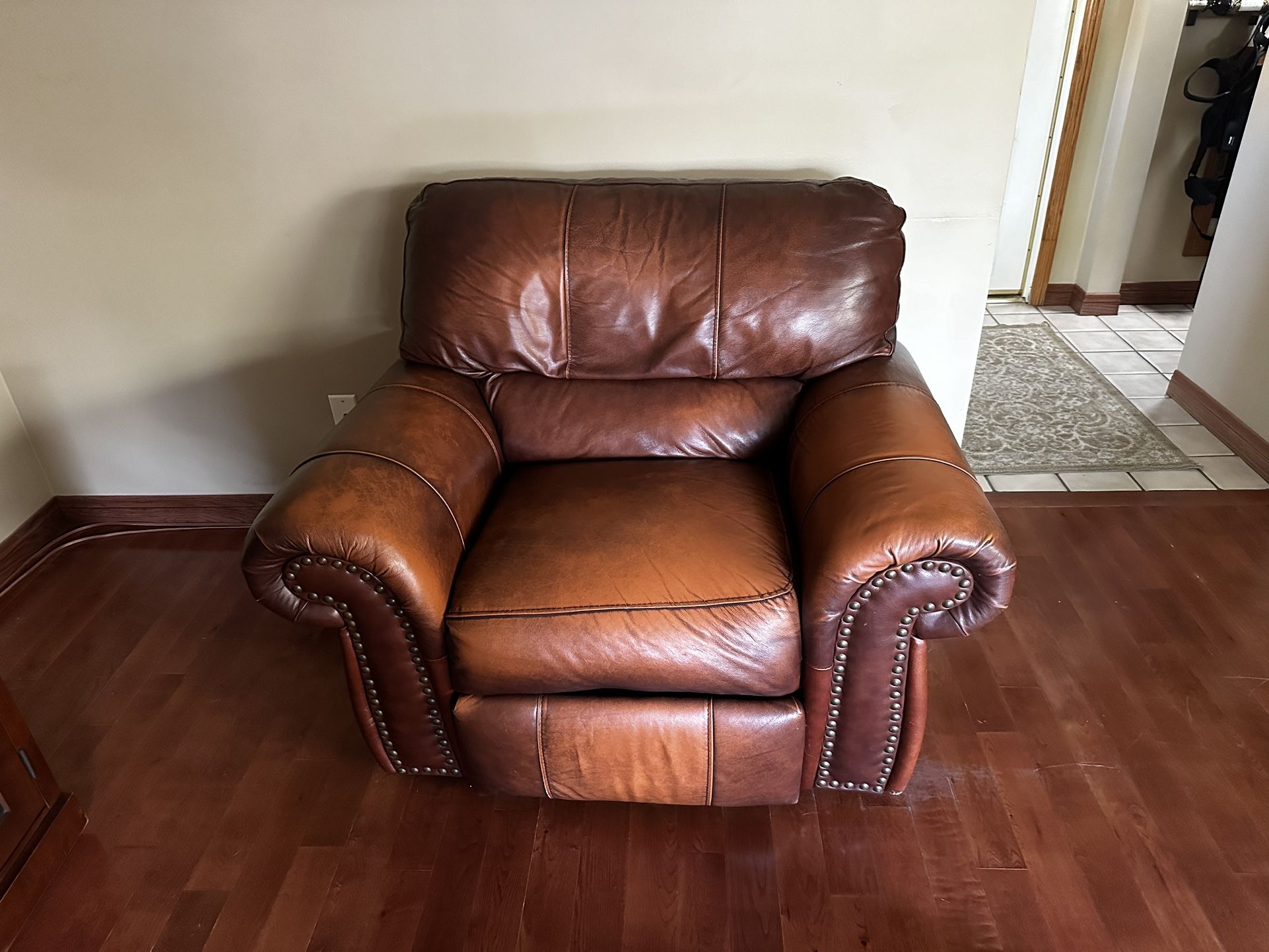 Three-Piece Leather Sofa-recliner, Loveseat, And Recliner