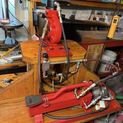 HYDRAULIC HOLE PUNCHING MACHINE. BUYER MUST DISASSEMBLE,PICK UP AND DELIVER.$150.00 OR BEST OFFER.