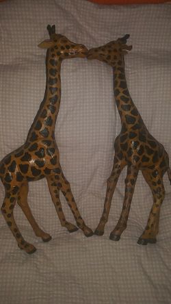 Two giraffes 22 in tall the pear