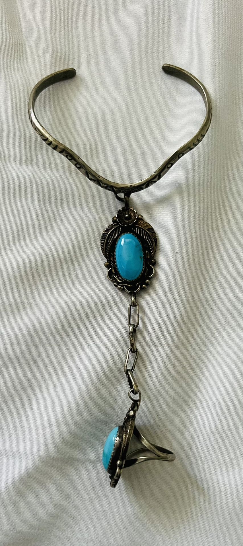Turquoise bracelet with connected ring