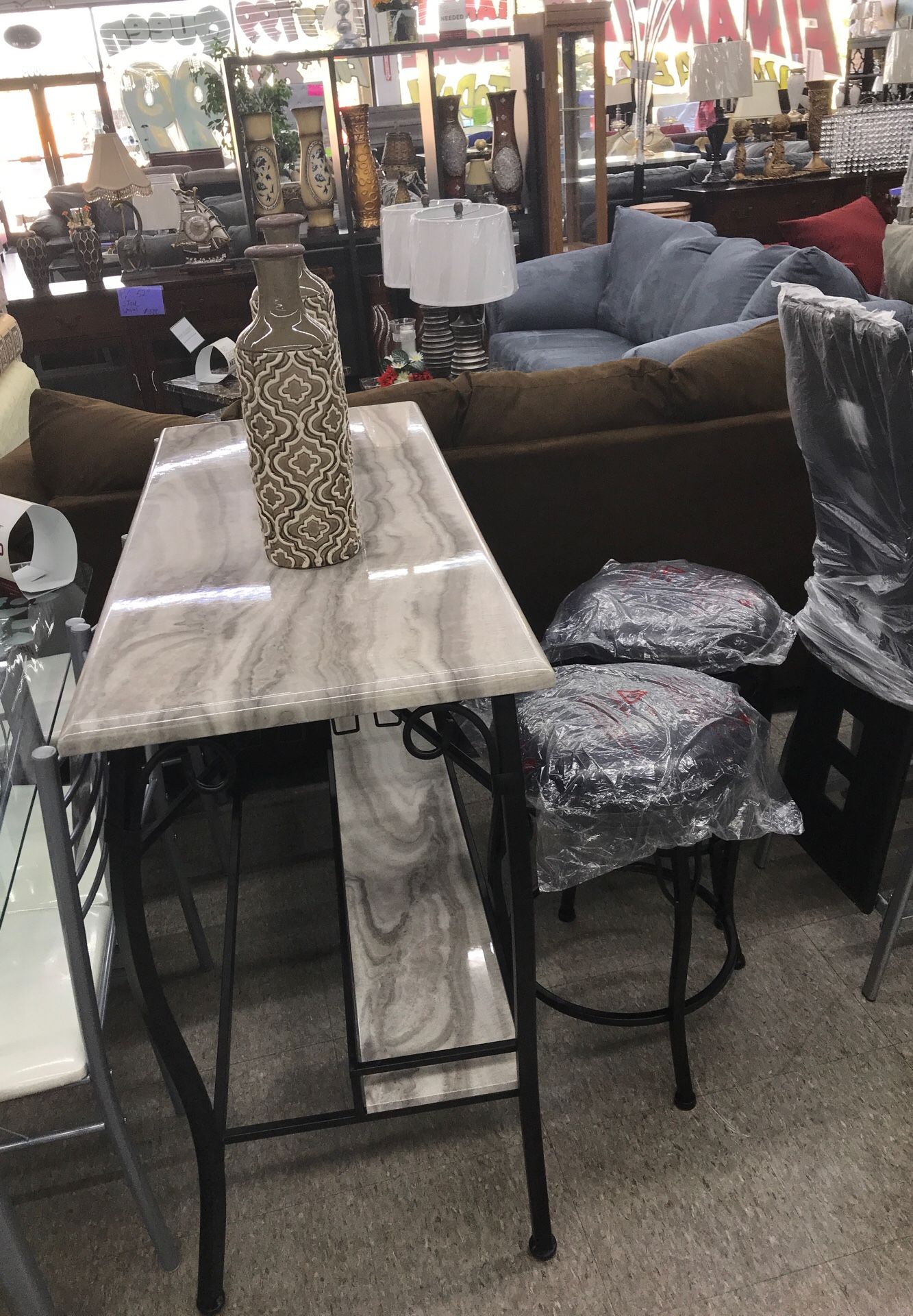 Bar with 2 bar stools for $299