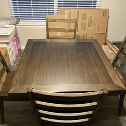 Table And 4 Chairs   