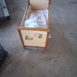 Old  Doll Crib  With Side That Goes Down.
