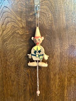 Vintage Wooden Clown Sticking Out Tongue Pull-String Christmas Ornament