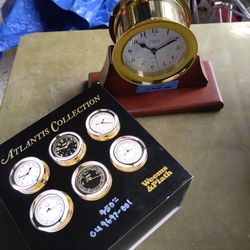 CU9697-001 Never Used Weems And Plaths Atlantis Quartz Clock With Wooden Base