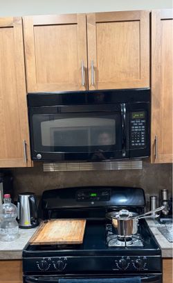 Works perfect! GE Microwave & Vent
