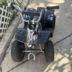 Razor Dirt Quad - 24V Powered Ride-On, 12" Knobby Air-Filled Tires, Electric 4-Wheeler for Kids 8+